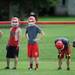 Whitmore Lake football players wait in line for their turn during a practice drill at the school on Tuesday, August 13, 2013. Melanie Maxwell | AnnArbor.com